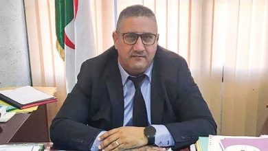 عادل تجار