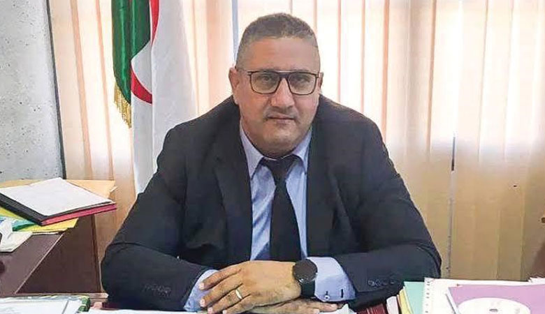 عادل تجار